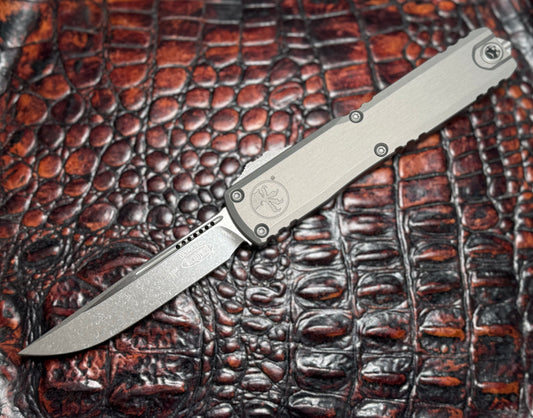 MICROTECH - Ultratech Gen III ZBP S/E in Natural Clear W/ Apocalyptic Blade. Model # 1121-10 APNC